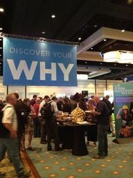 A Discover Your Why banner over the show floor