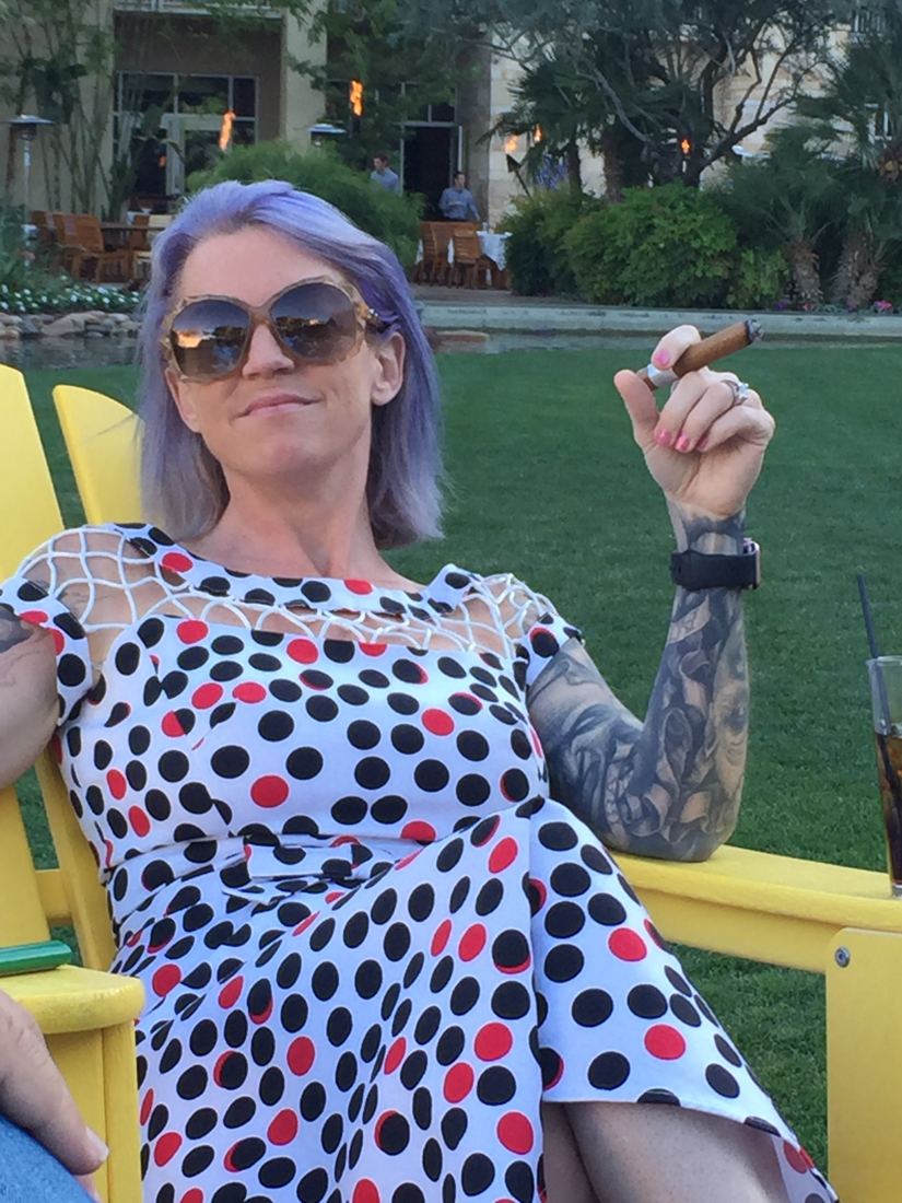 Lounging with a cigar in a yellow lawn chair