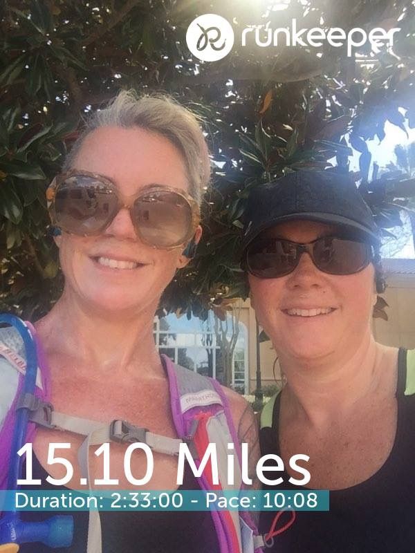 A running selfie with a 15.10-mile run summary