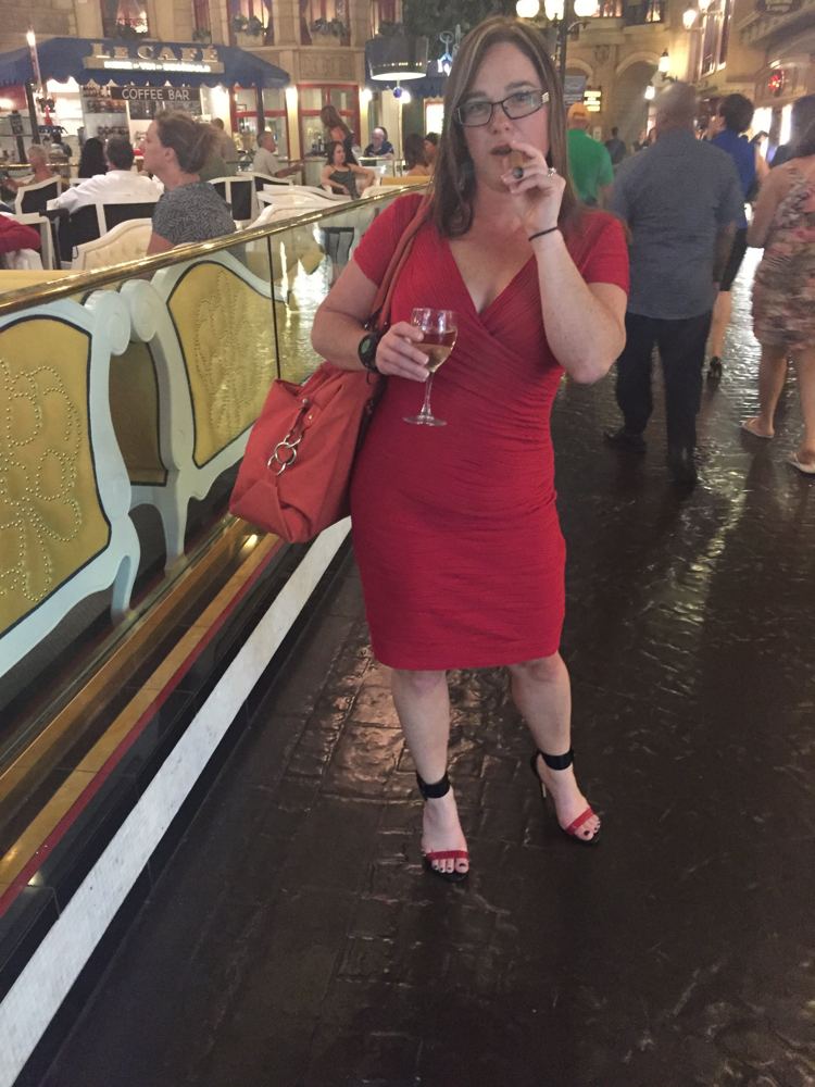 Tracie Orisko from Huntress smoking a cigar.
