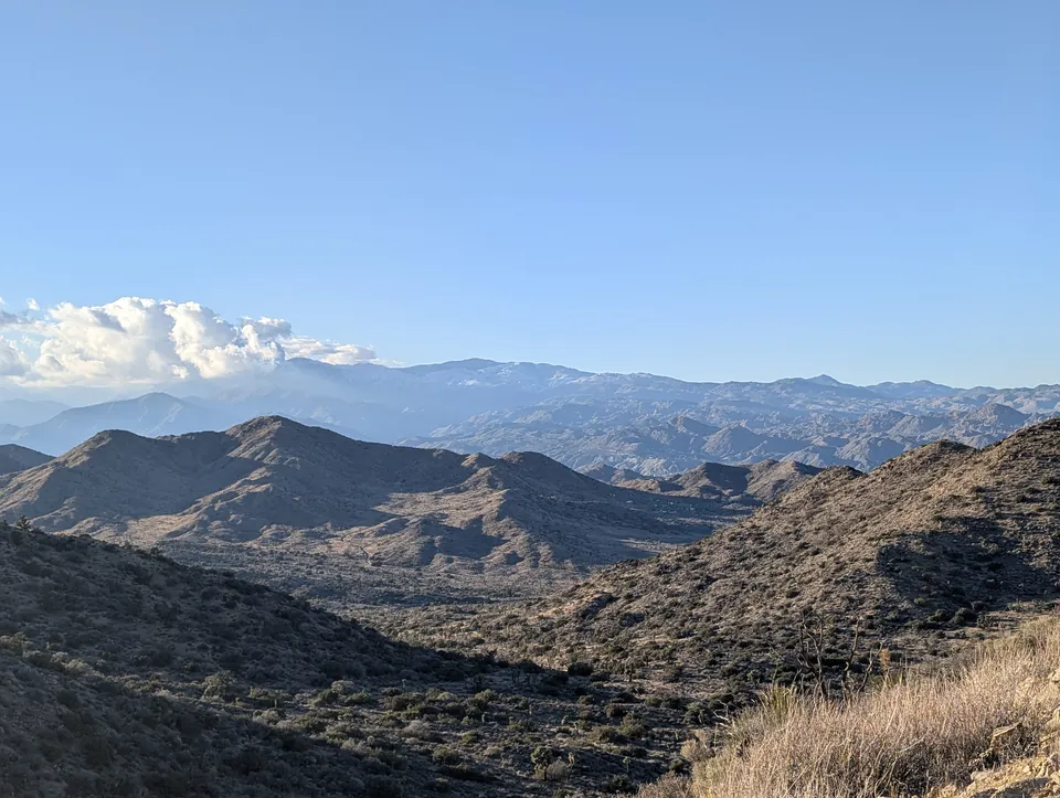 Panoramic mountain view from a summit ridge